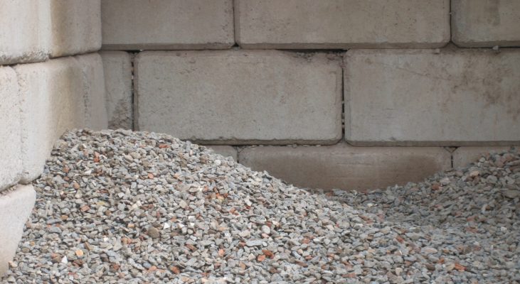 Concrete interlocking blocks displayed with concrete aggregate Minto