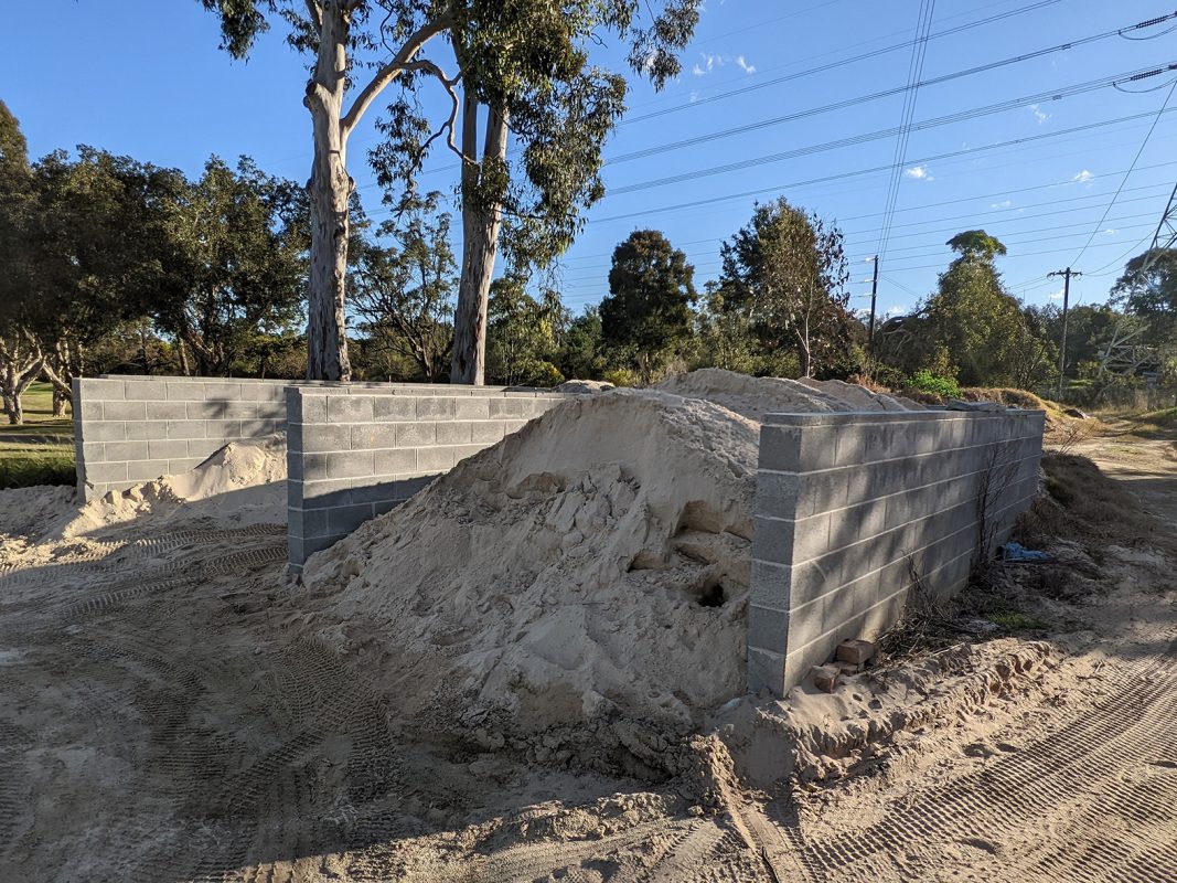 Concrete blocks for sand bay on golf course