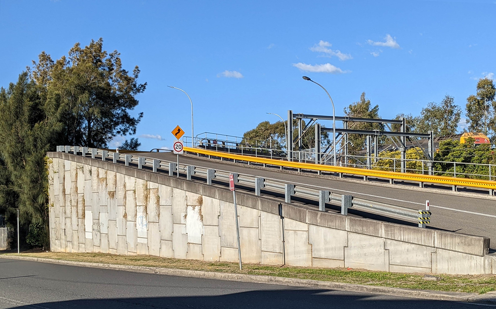 Large interlocking concrete blocks for retaining wall railway - Transport NSW Australia